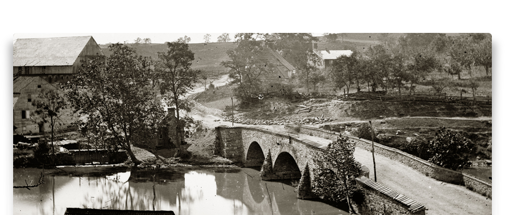 A historic photo of the Newcomer House and Barn along Antietam Creek