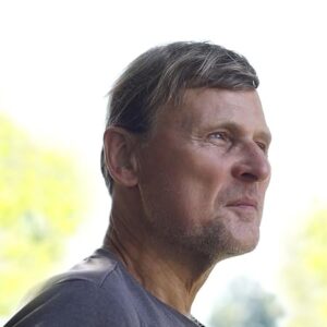 Photo of author John U. Rees